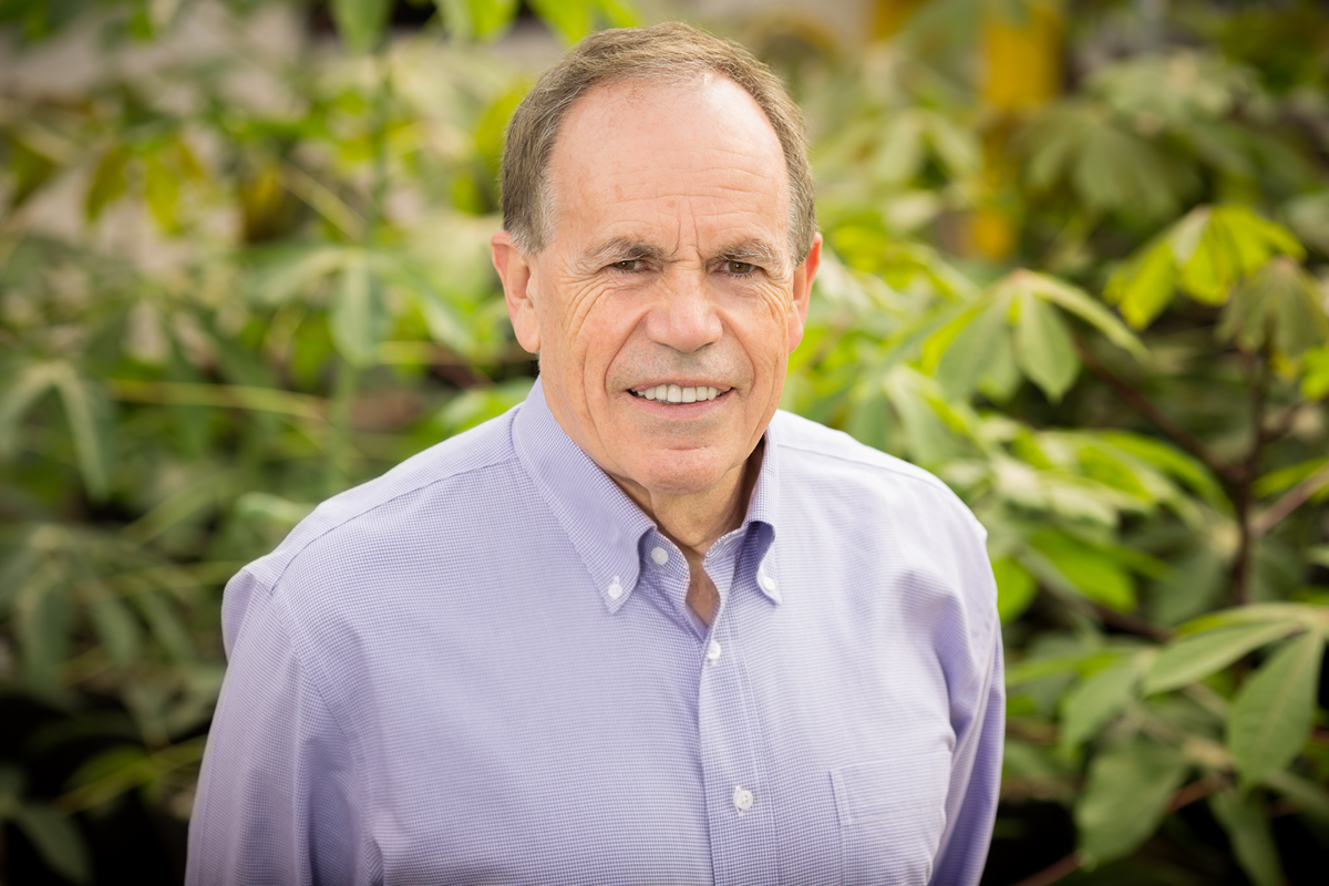 Stephen P. Long portrait taken in a greenhouse at the University of Illinois.