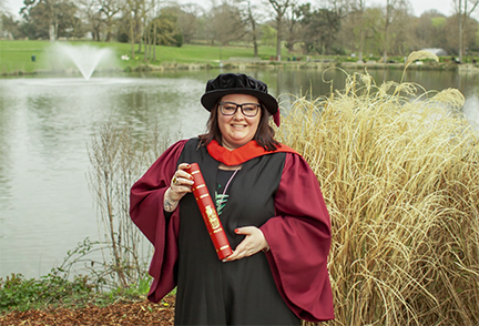Shellie Wall in her graduation regalia