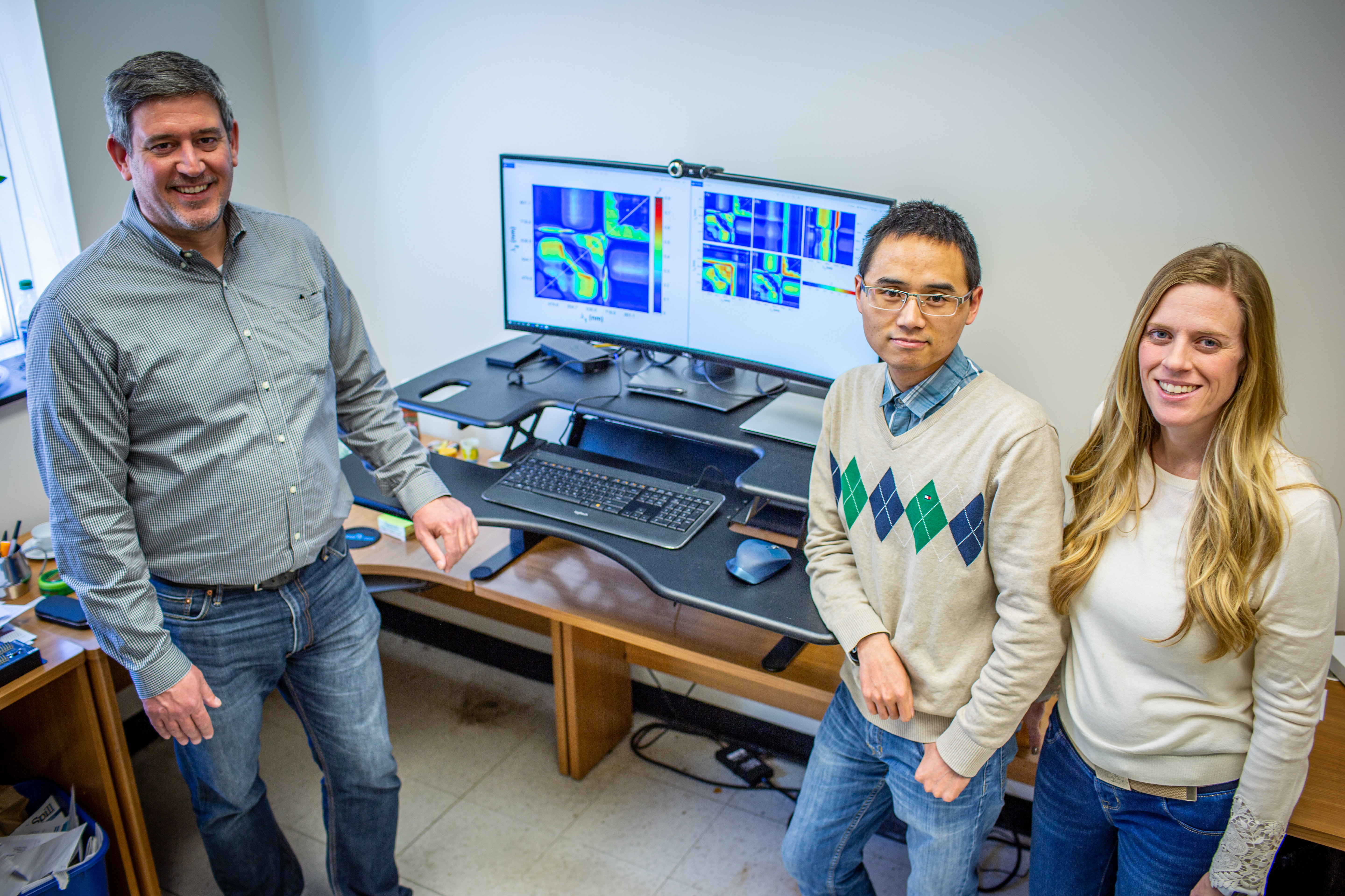 USDA-ARS Research Plant Physiologist Carl Bernacchi (left) with Postdoctoral Researchers Peng Fu (middle) and Katherine Meacham-Hensold (right)