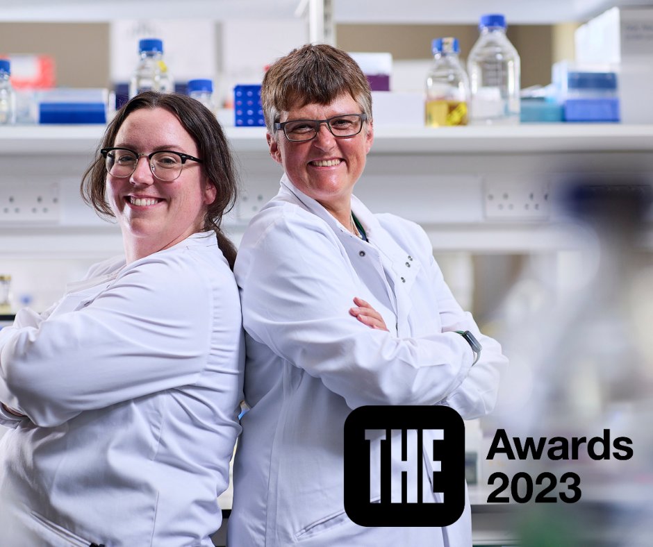 Amanda Cavanagh (left) and Tracy Lawson standing back to back, wearing labcoats.