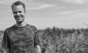 Johannes Kromdijk stands in a field